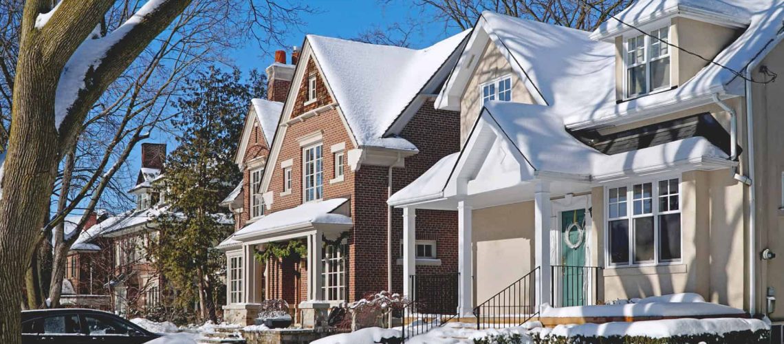 suburban street on a sunny day after a snow storm